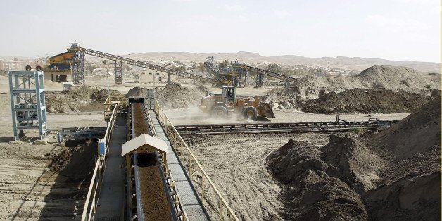 A bulldozer works at a phosphate mines in Metlaoui, Tunisia